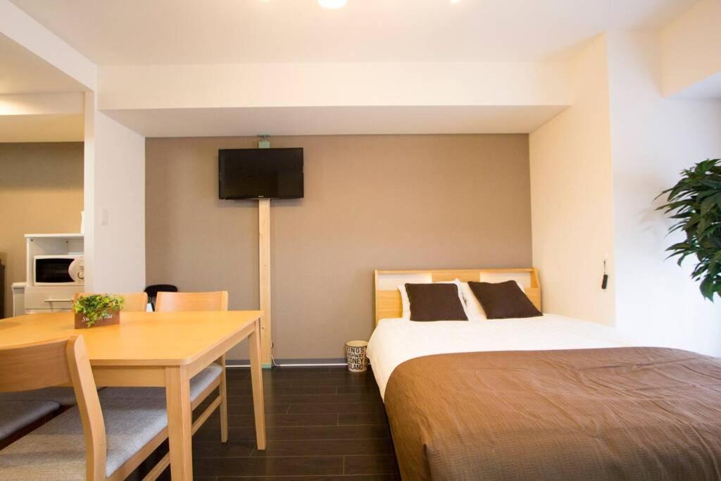 ようこそ札幌へ! 大通公園まで地下鉄10分 定員6名 Firetv完備 1階はセコマ Apartment Exterior photo